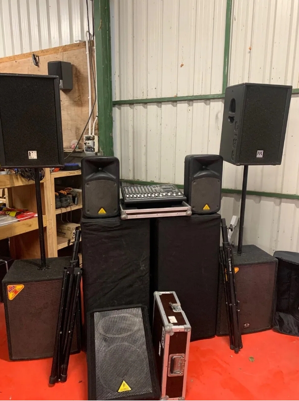 Speakers , base bins and a mixing desk