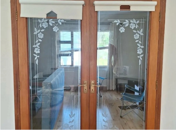 Solid wood double doors with glass panel